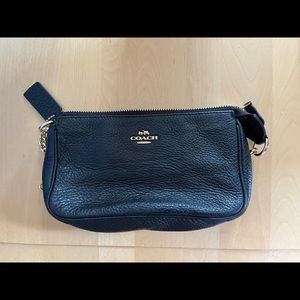 Coach black leather wristlet in mint condition.